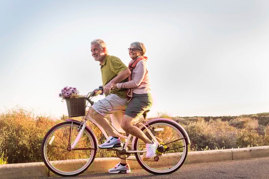 couple riding a bike together